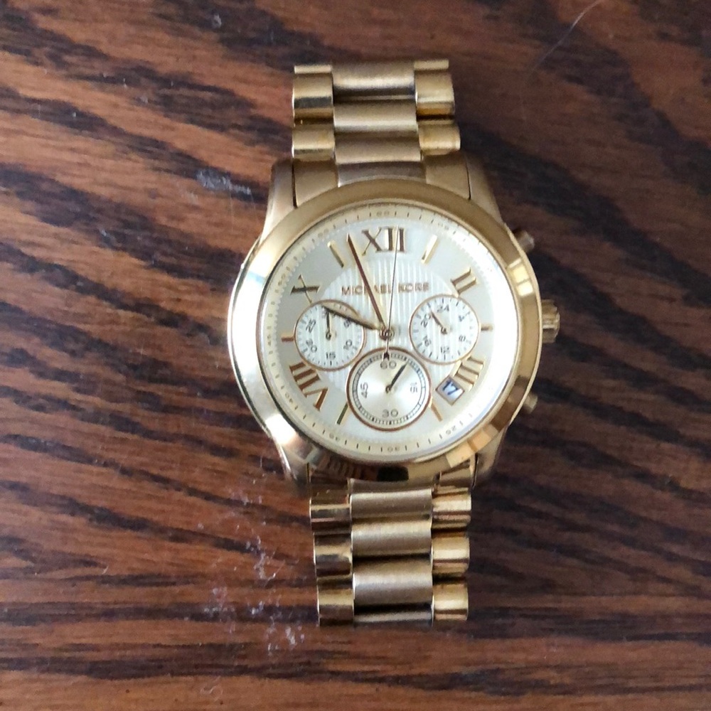 Micheal Kors boyfriend watch.